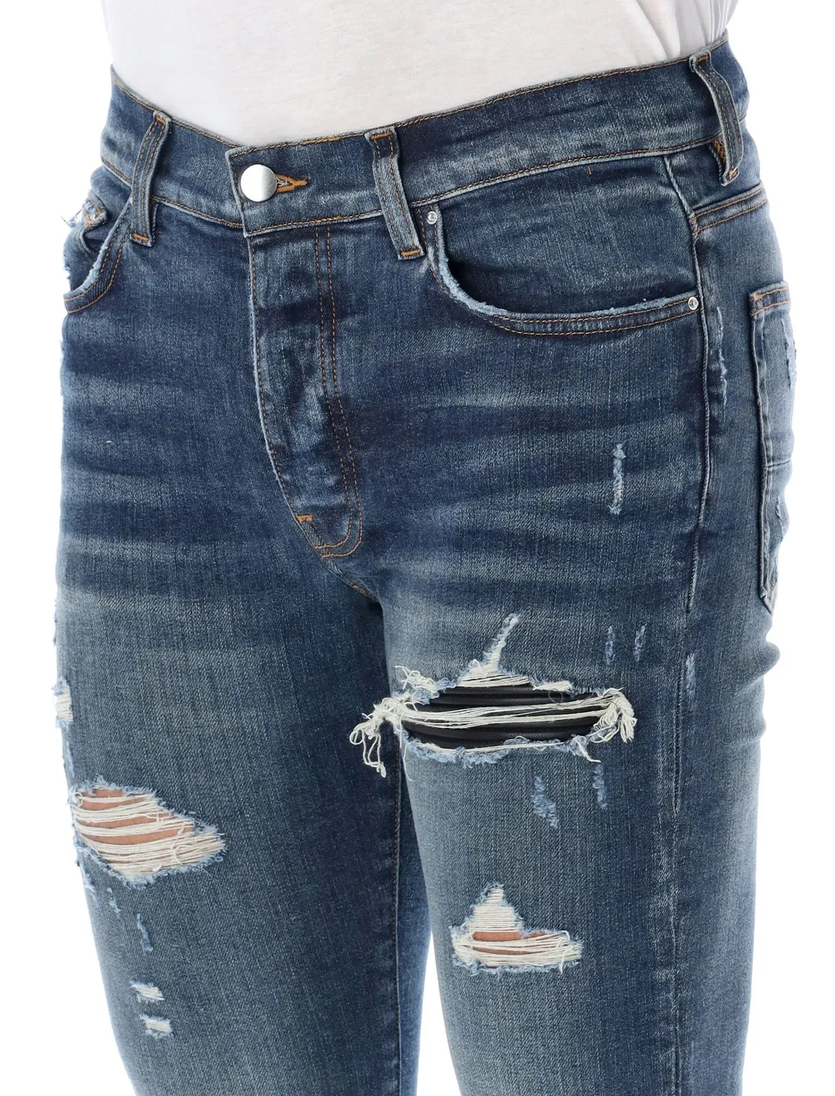 AMIRI MX1 DISTRESSED SKINNY LEG JEANS